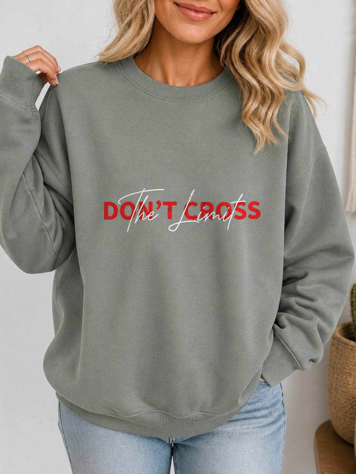 Don't Cross The Limit Vintage Boho Graphic Sweatshirt - Hanes_Stonewashed_Green Model