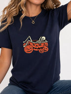Skeleton Chilling In Pumpkin Graphic Tee - Navy Model