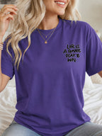 Life Is A Game Play To Win Hand Lettering Graphic T-Shirt - Lilac Model