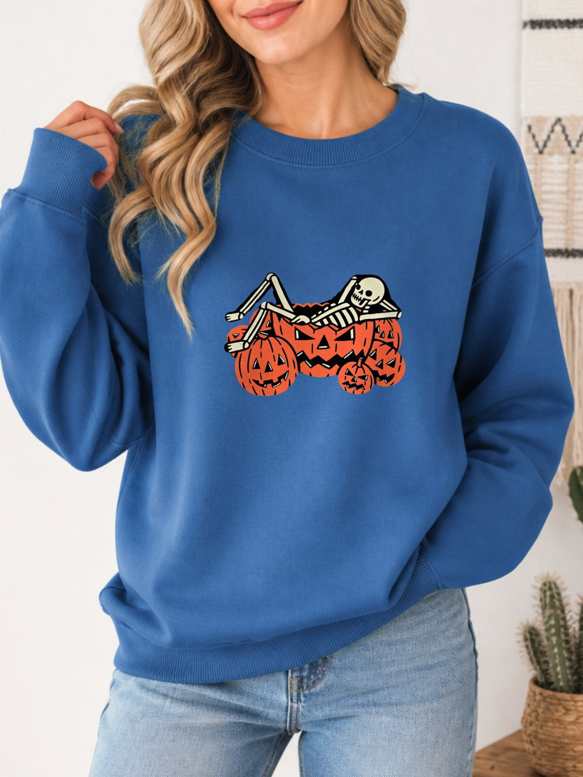 Skeleton Chilling In Pumpkin Retro Graphic Sweatshirt - Hanes_Denim_Blue Model