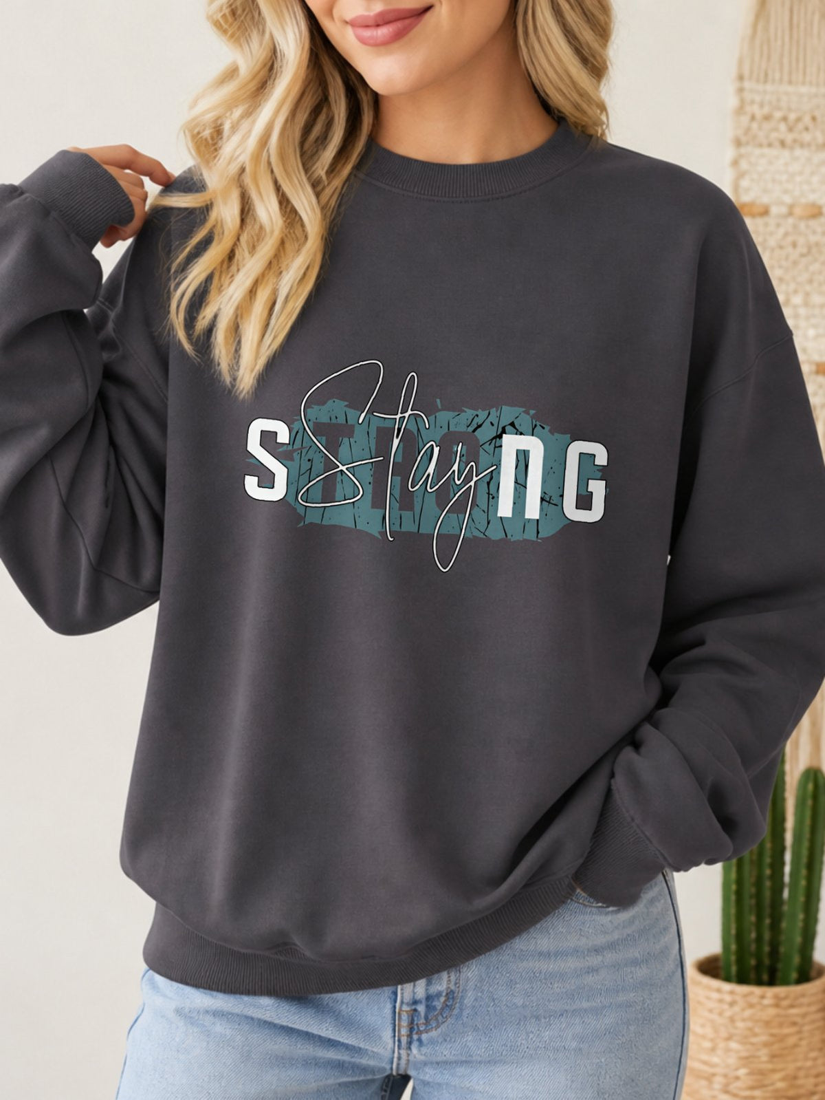 Stay Strong Vintage Boho Graphic Sweatshirt - Hanes_Charcoal_Heather Model