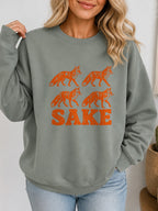 Four Foxes Sake Vintage Boho Graphic Sweatshirt - Hanes_Stonewashed_Green Model
