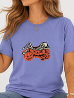 Skeleton Chilling In Pumpkin Graphic Tee - Violet Model