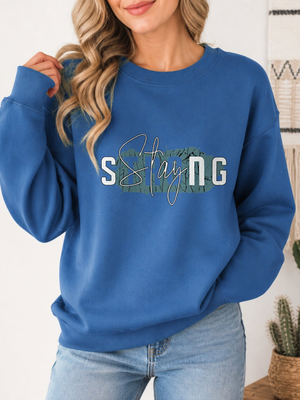 Stay Strong Vintage Boho Graphic Sweatshirt - Hanes_Denim_Blue Model