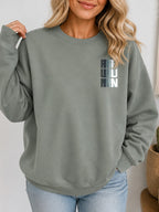 Stay Strong Vintage Boho Graphic Sweatshirt - Hanes_Stonewashed_Green Model
