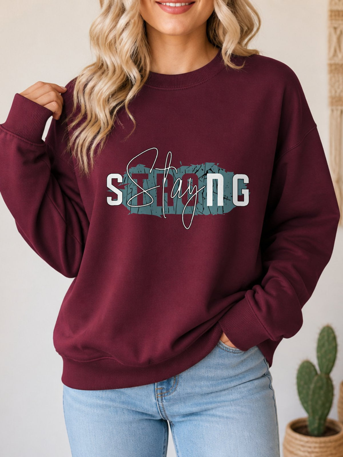 Stay Strong Vintage Boho Graphic Sweatshirt - Hanes_Maroon Model
