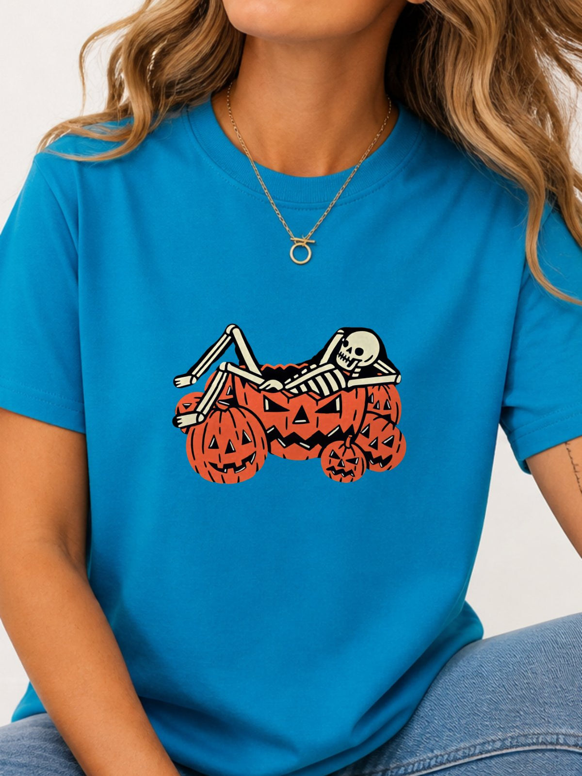 Skeleton Chilling In Pumpkin Graphic Tee - Sapphire Model