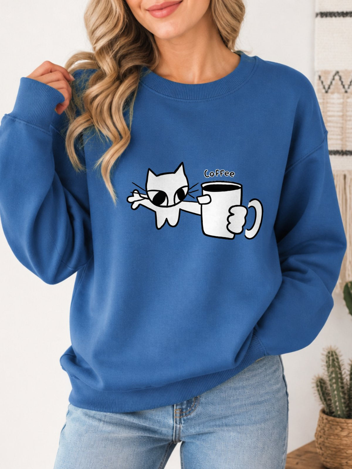 Cat Holding Coffee Vintage Boho Graphic Sweatshirt - Hanes_Denim_Blue Model