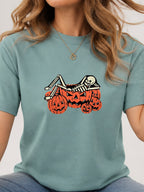 Skeleton Chilling In Pumpkin Graphic Tee - Aquatic Model