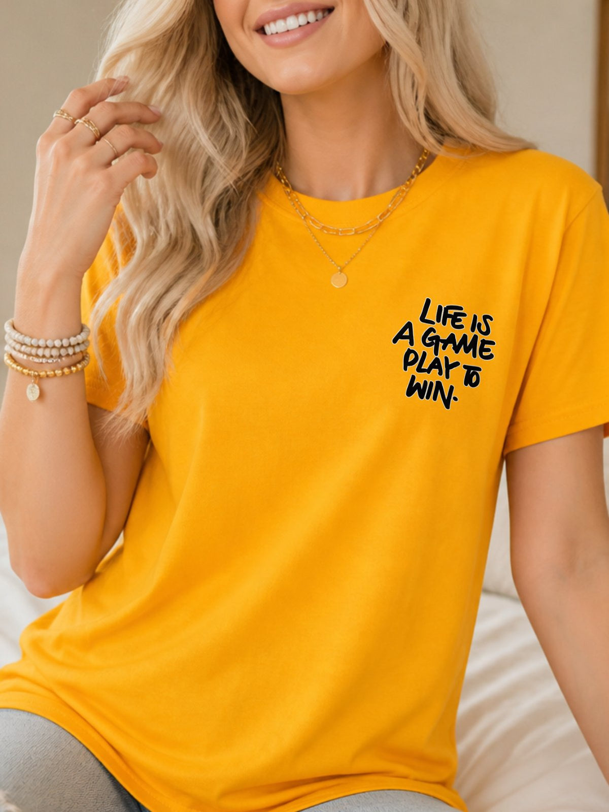 Life Is A Game Play To Win Hand Lettering Graphic T-Shirt - Gold Model
