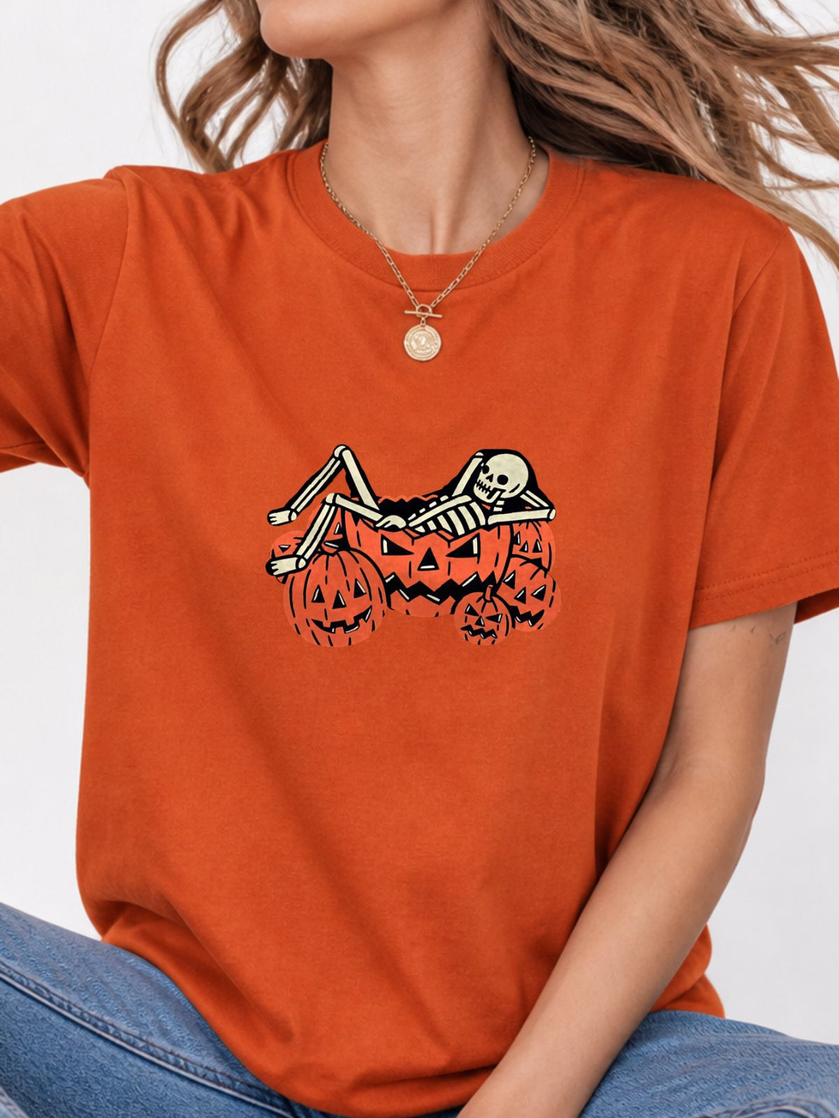 Skeleton Chilling In Pumpkin Graphic Tee - Texas Orange Model