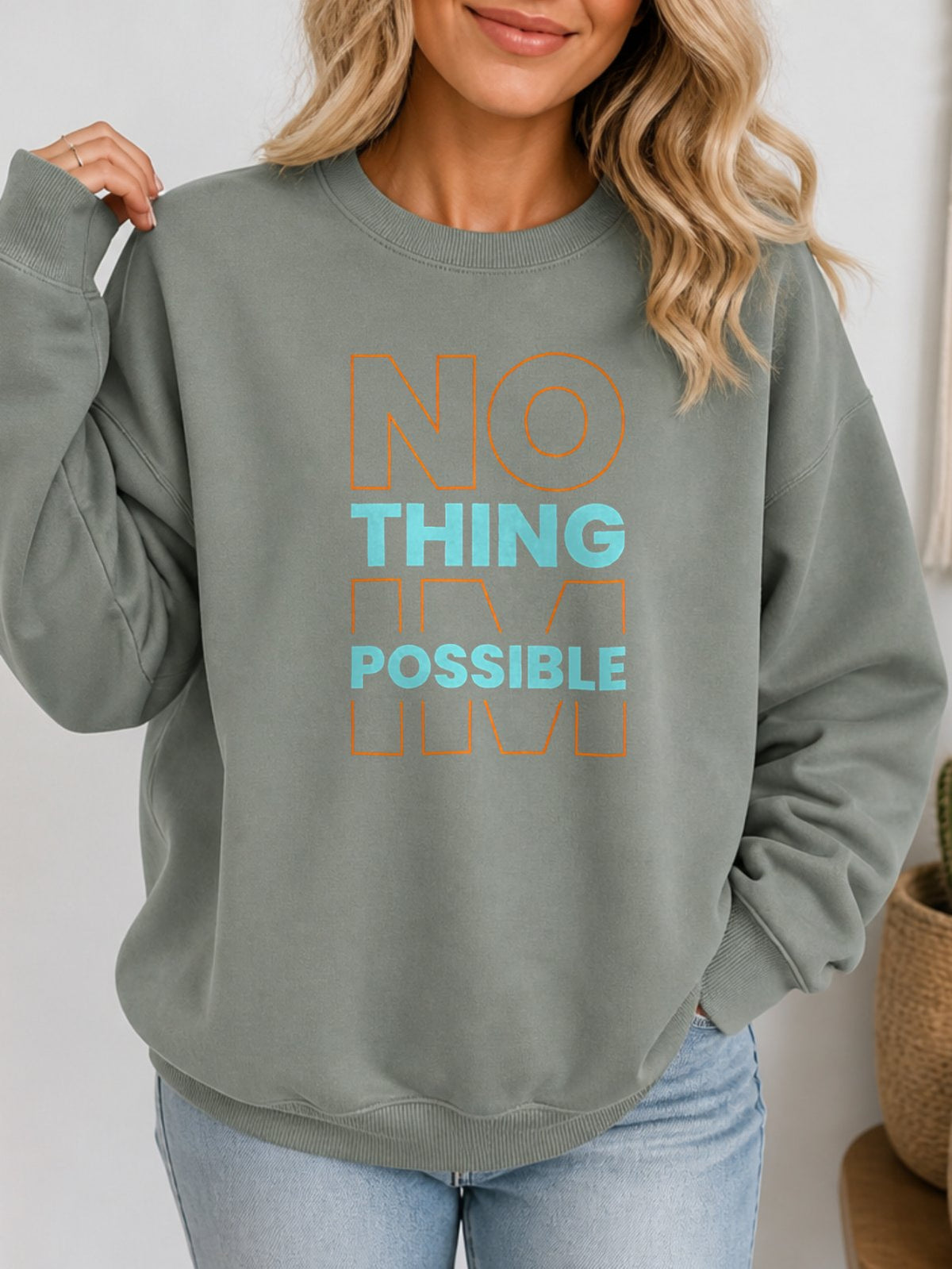 Nothing Impossible Vintage Boho Graphic Sweatshirt - Hanes_Stonewashed_Green Model