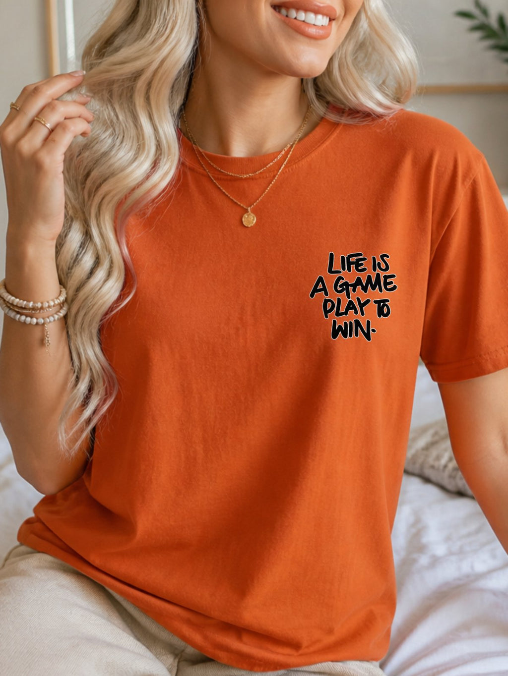 Life Is A Game Play To Win Hand Lettering Graphic T-Shirt - Texas Orange Model