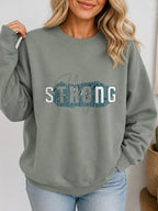 Stay Strong Vintage Boho Graphic Sweatshirt - Hanes_Stonewashed_Green Model