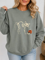 Skeleton Cat Pumpkin Vintage Halloween Sweatshirt - Hanes_Stonewashed_Green Model