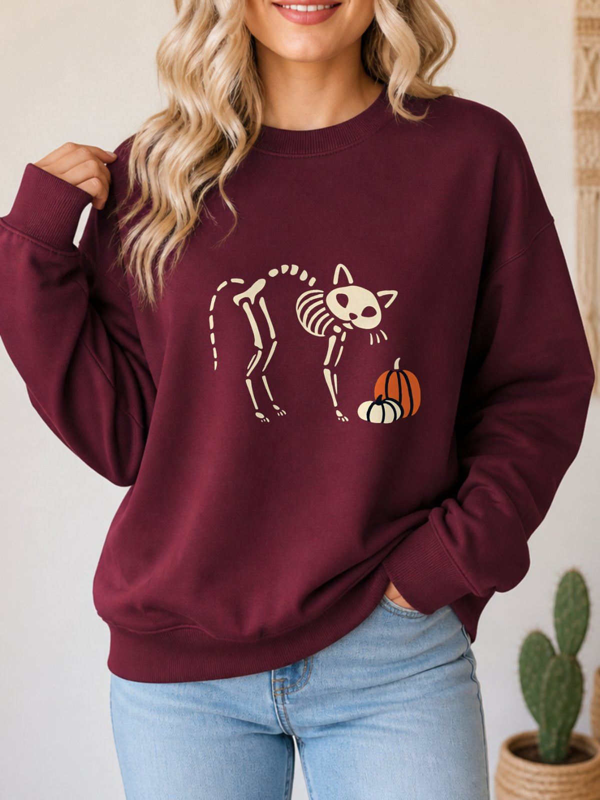 Skeleton Cat Pumpkin Vintage Halloween Sweatshirt - Hanes_Maroon Model