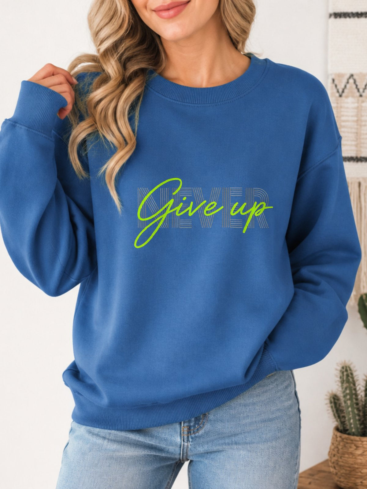 Never Give Up Vintage Boho Graphic Sweatshirt - Hanes_Denim_Blue Model