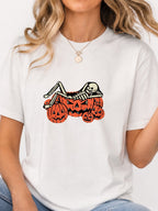 Skeleton Chilling In Pumpkin Graphic Tee - White Model