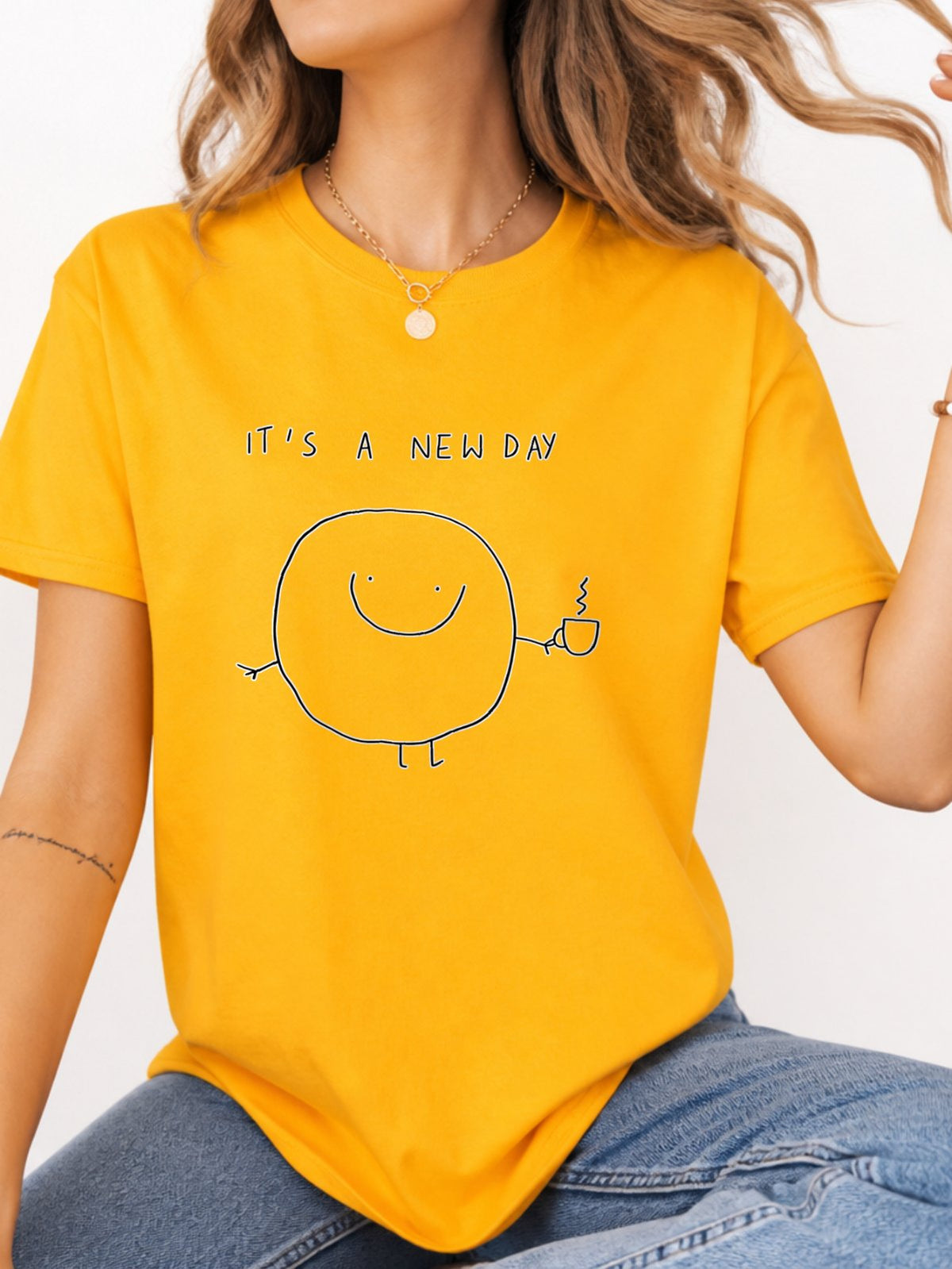 It's A New Day Coffee Cartoon Doodle Graphic T-Shirt - Gold Model