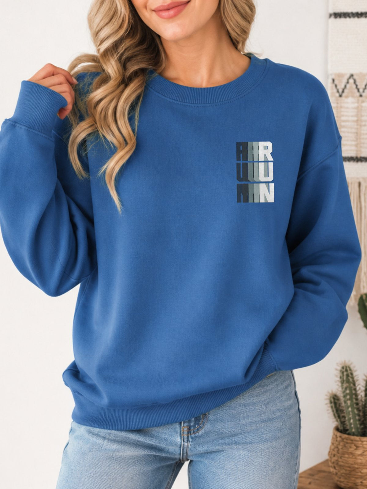 Stay Strong Vintage Boho Graphic Sweatshirt - Hanes_Denim_Blue Model