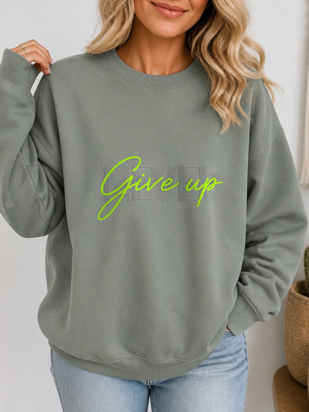 Never Give Up Vintage Boho Graphic Sweatshirt - Hanes_Stonewashed_Green Model